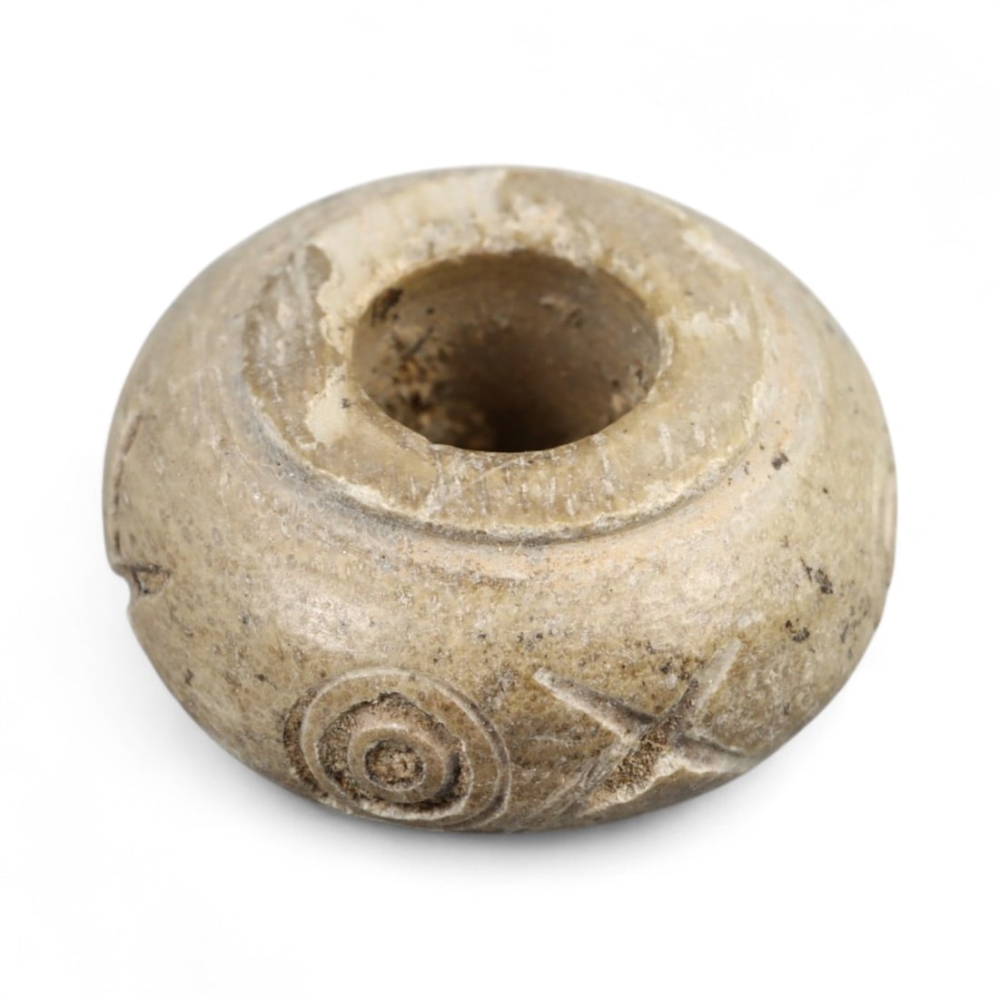 Ancient Parthian Symbolic Domed Bronze Spindle Whorl, c. 2nd-3rd Century CE, 1.4cm, 1.3g: This compact and intricately cast spindle whorl hails from the Parthian Empire, a powerful civilization that flourished across Iran and Mesopotamia from the 3rd century BCE to the 3rd century CE. Dati