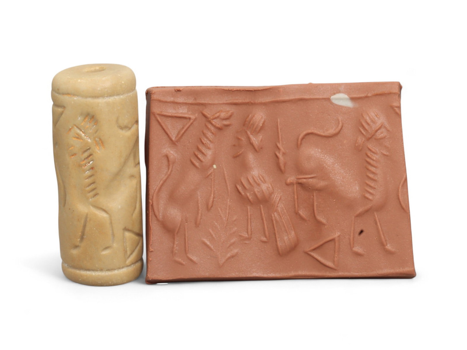 Ancient Mesopotamian Administrative Cylinder Seal, c. 2nd-1st Millennium BCE, 18g: This authentic cylinder seal from ancient Mesopotamia dates to the 2nd to 1st millennium BCE, a time when the art of carving miniature narratives on stone reached remarkable levels of refinement. Seal