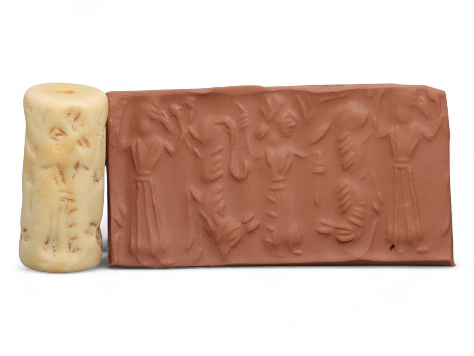 Ancient Mesopotamian Administrative Cylinder Seal, c. 2nd-1st Millennium BCE, 20g: This authentic cylinder seal from ancient Mesopotamia dates to the 2nd to 1st millennium BCE, a time when the art of carving miniature narratives on stone reached remarkable levels of refinement. Seal