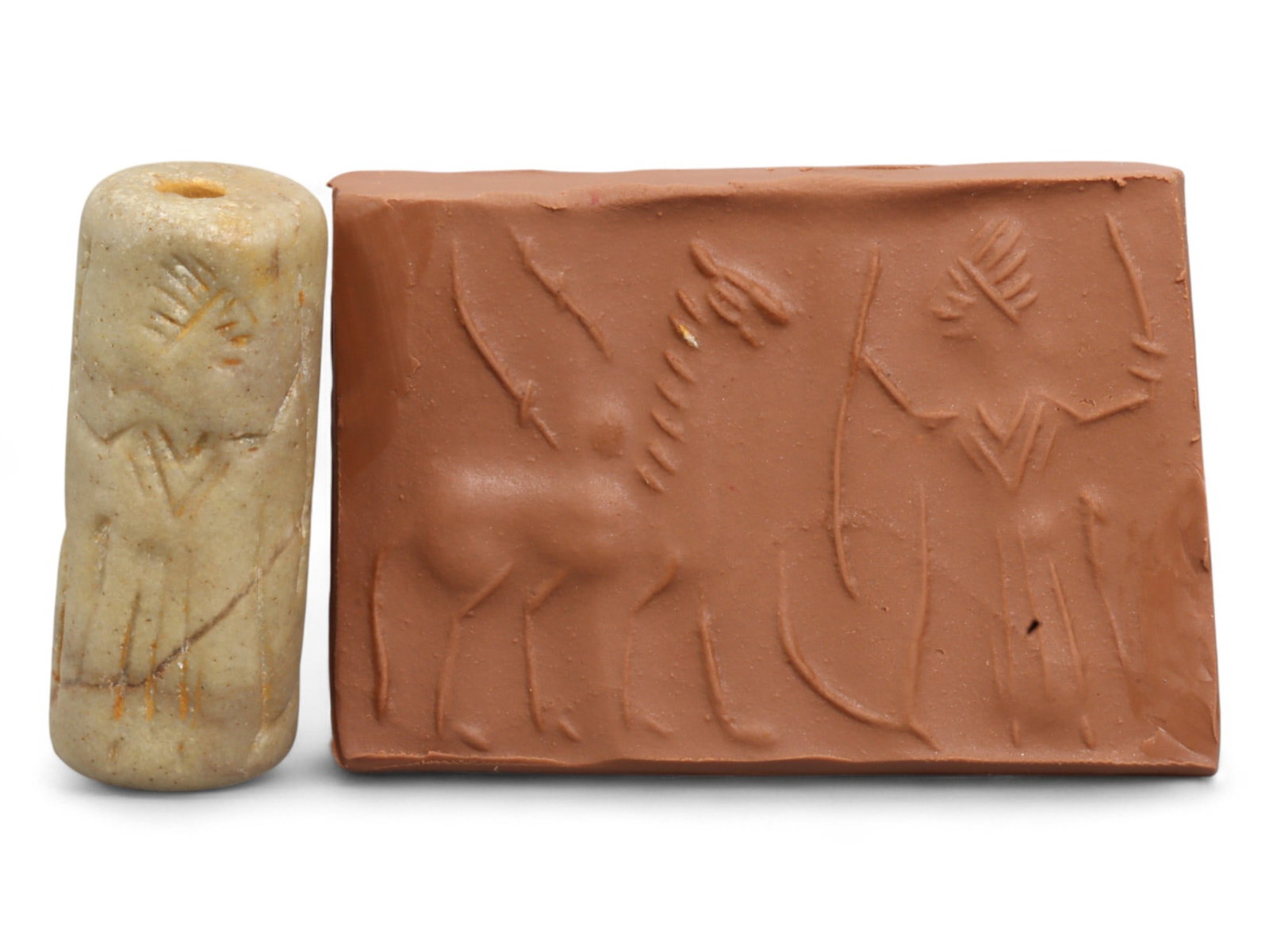 Ancient Mesopotamian Administrative Cylinder Seal, c. 2nd-1st Millennium BCE, 19g: This authentic cylinder seal from ancient Mesopotamia dates to the 2nd to 1st millennium BCE, a time when the art of carving miniature narratives on stone reached remarkable levels of refinement. Seal