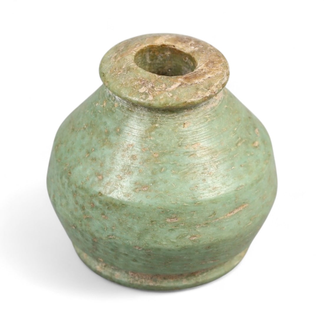 Ancient Sasanian Domed Green Bone Spindle Whorl, c. 4th-6th Century CE, 1.5cm, 3.4g: This elegantly shaped spindle whorl, carved from naturally green-hued bone, is a refined artifact from the Sasanian Empire, a dominant Persian dynasty known for its vibrant artistic traditions and Zor