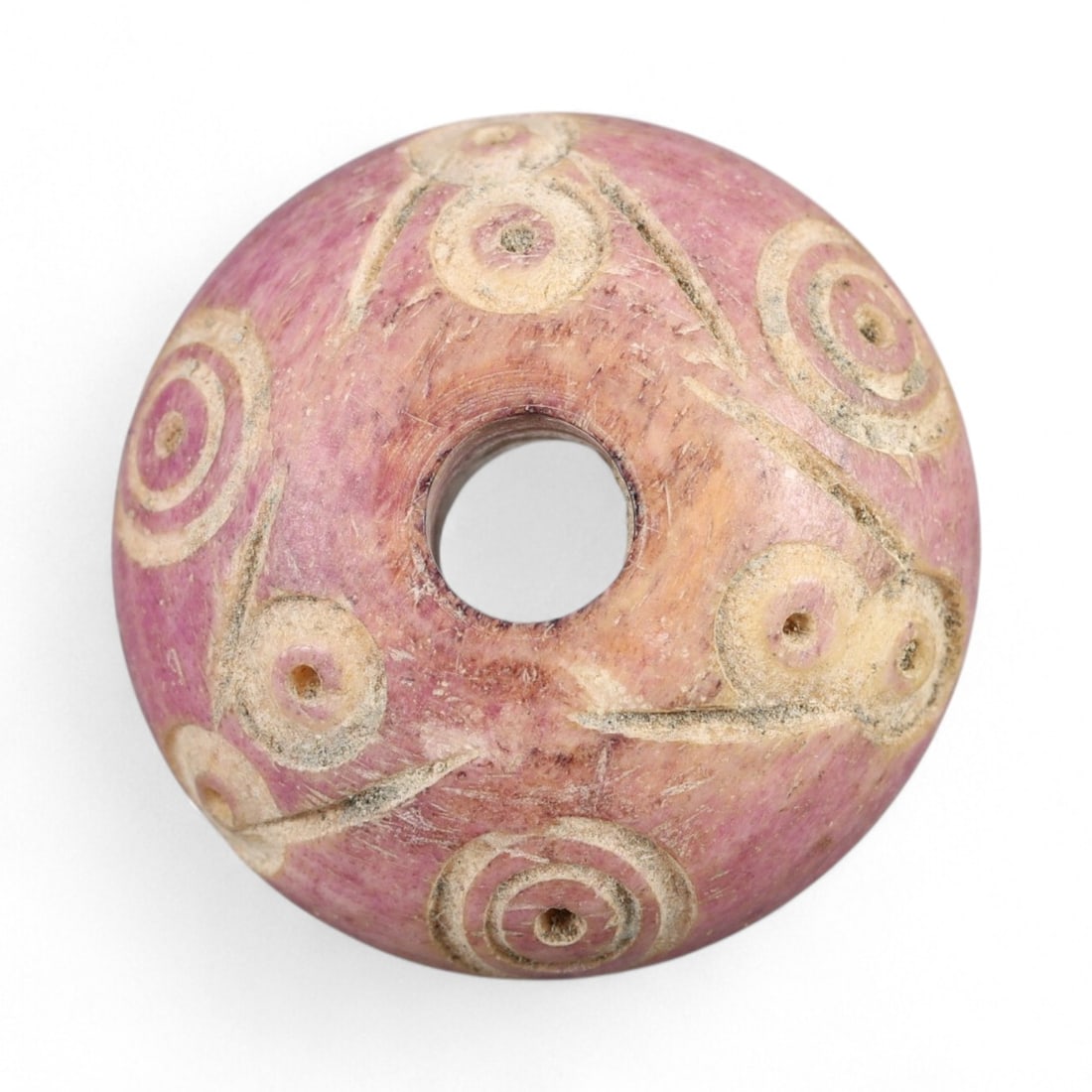 Ancient Parthian Symbolic Domed Bronze Spindle Whorl, c. 2nd-3rd Century CE, 1.9cm, 3.6g: This compact and intricately cast spindle whorl hails from the Parthian Empire, a powerful civilization that flourished across Iran and Mesopotamia from the 3rd century BCE to the 3rd century CE. Dati