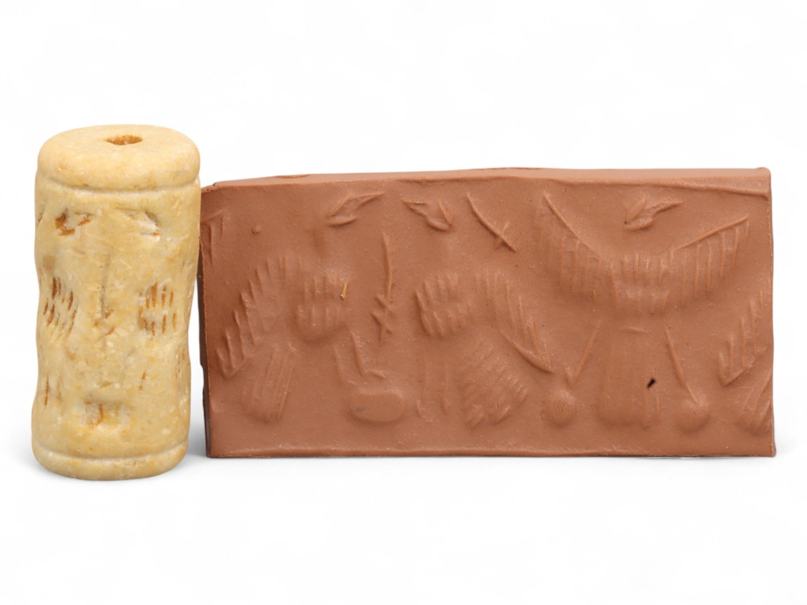 Ancient Mesopotamian Administrative Cylinder Seal, c. 2nd-1st Millennium BCE, 17g: This authentic cylinder seal from ancient Mesopotamia dates to the 2nd to 1st millennium BCE, a time when the art of carving miniature narratives on stone reached remarkable levels of refinement. Seal