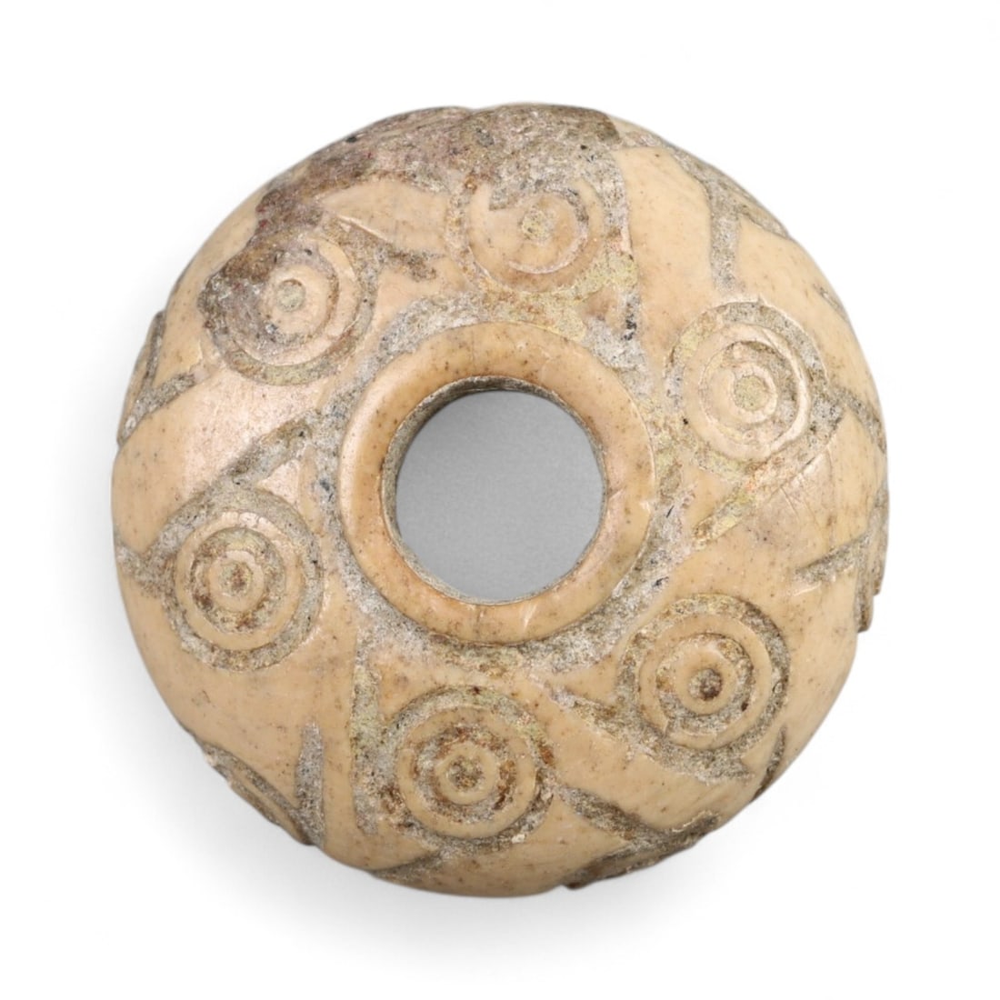Ancient Parthian Symbolic Domed Bronze Spindle Whorl, c. 2nd-3rd Century CE, 1.6cm, 2.1g: This compact and intricately cast spindle whorl hails from the Parthian Empire, a powerful civilization that flourished across Iran and Mesopotamia from the 3rd century BCE to the 3rd century CE. Dati