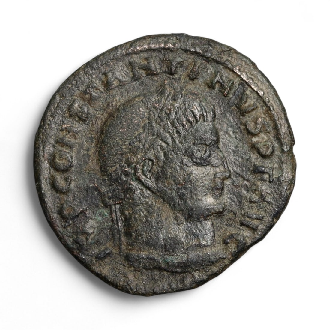 ROMAN EMPIRE: Imperial Authority - Bronze Coin, c. 1st-3rd Century AD, 20mm: Struck during the turbulent decades of the later Roman Empire, this 19mm bronze coin reflects the enduring symbolism of imperial control amidst crisis. Its compact yet deliberate design likely feature