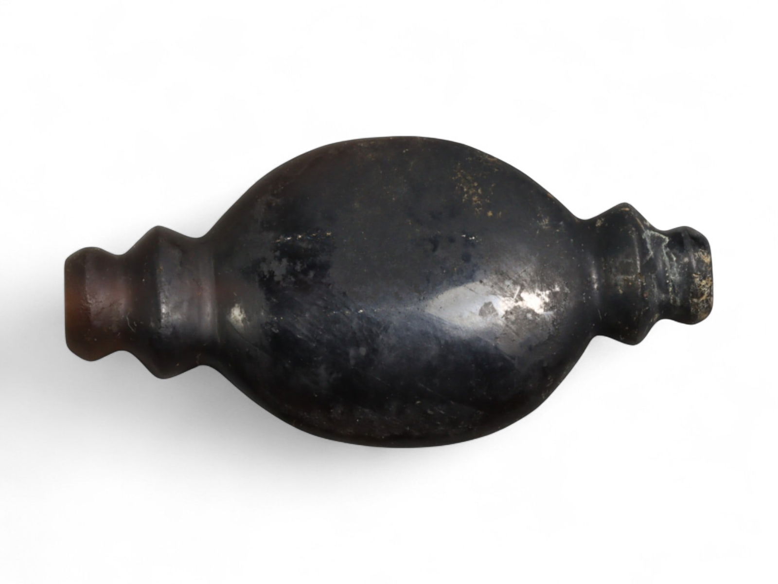 Ancient Near Eastern Collared Carnelian Amulet Bead, c. 2nd-1st Millennium BC, 4cm, 6g: This collared carnelian bead, measuring 5 cm in length and weighing 9 grams, is characteristic of bead types produced in the Bronze and Iron Age Near East, particularly from Mesopotamia and Iran. The