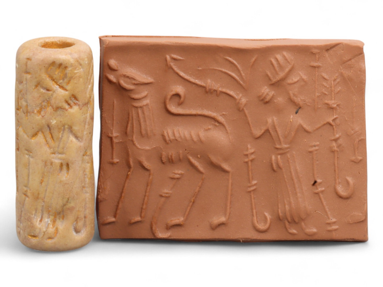 Ancient Mesopotamian Administrative Cylinder Seal, c. 2nd-1st Millennium BCE, 16g: This authentic cylinder seal from ancient Mesopotamia dates to the 2nd to 1st millennium BCE, a time when the art of carving miniature narratives on stone reached remarkable levels of refinement. Seal