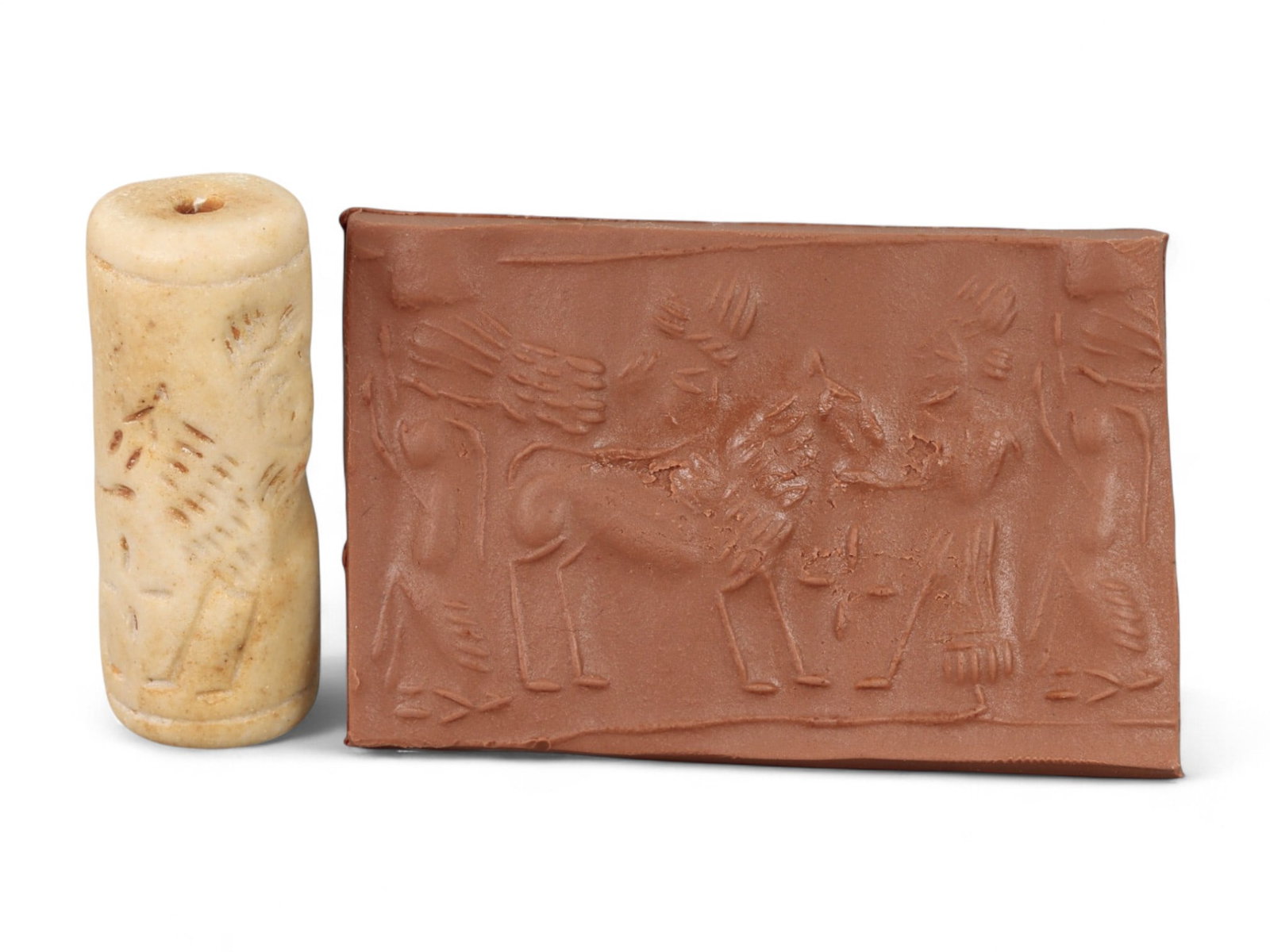 Ancient Mesopotamian Administrative Cylinder Seal, c. 2nd-1st Millennium BCE, 18g: This authentic cylinder seal from ancient Mesopotamia dates to the 2nd to 1st millennium BCE, a time when the art of carving miniature narratives on stone reached remarkable levels of refinement. Seal