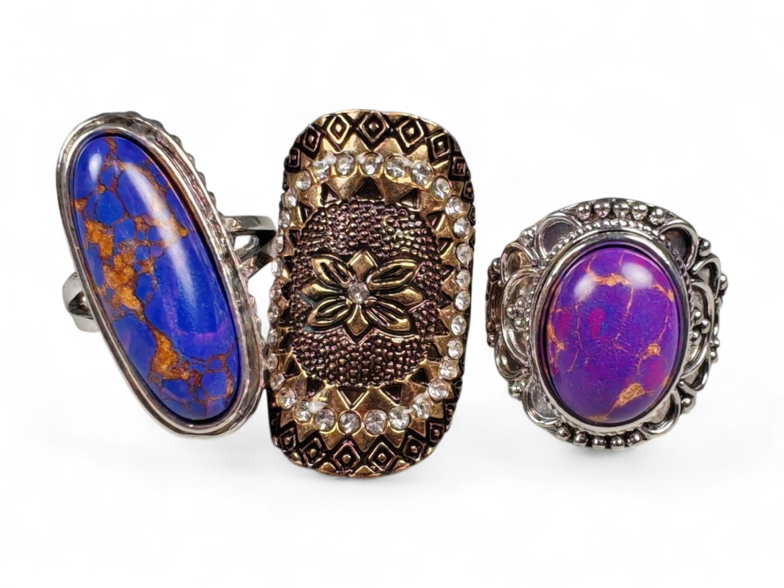Lot of 3 Vintage and Contemporary Fashion Ring Lot, c. 20th-21st Century: This assorted lot of vintage and contemporary fashion rings offers a vibrant collection of statement pieces showcasing diverse styles, materials, and craftsmanship. Designed for decorative wear rather