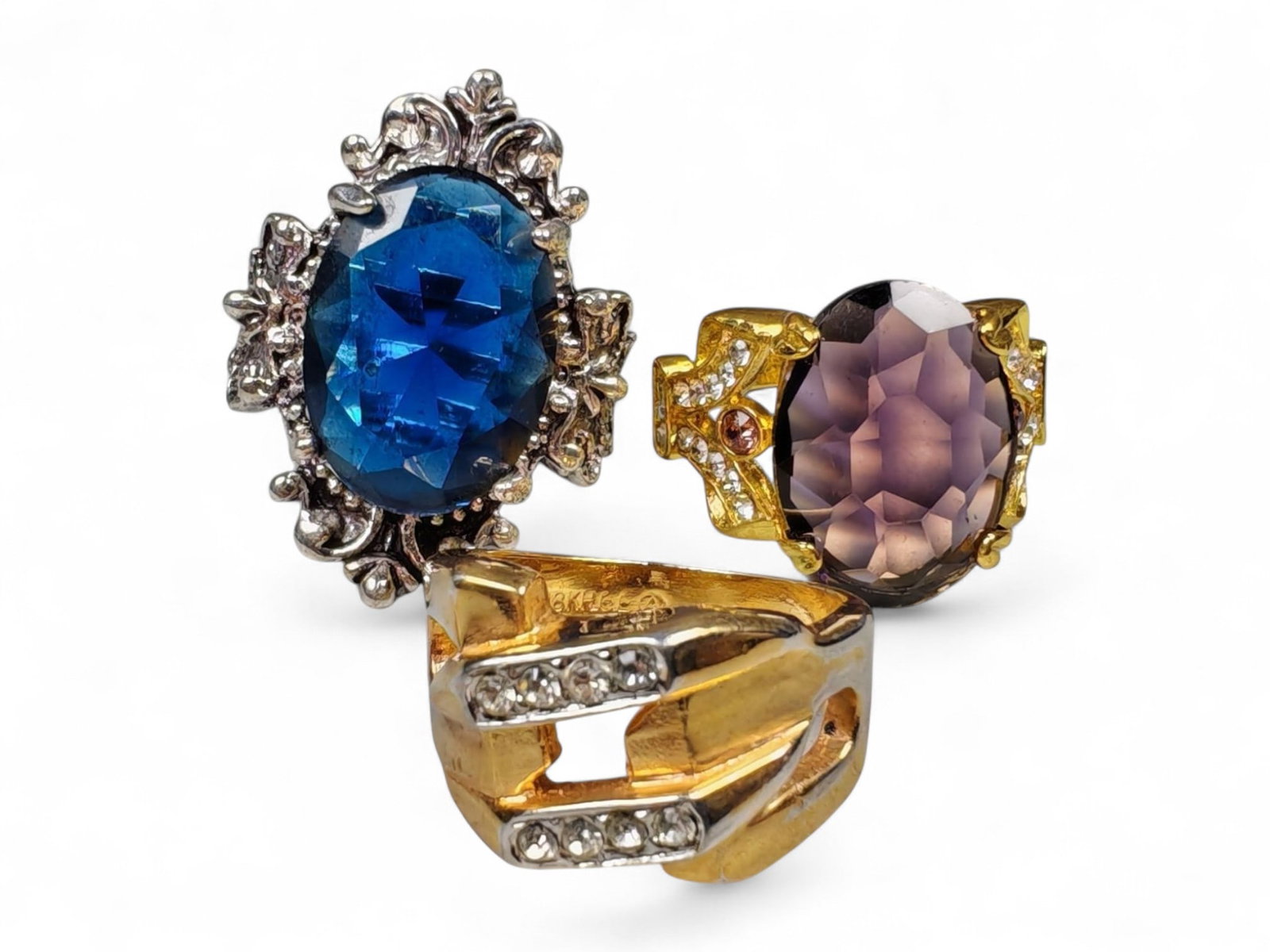 Lot of 3 Vintage and Contemporary Fashion Ring Lot, c. 20th-21st Century: This assorted lot of vintage and contemporary fashion rings offers a vibrant collection of statement pieces showcasing diverse styles, materials, and craftsmanship. Designed for decorative wear rather