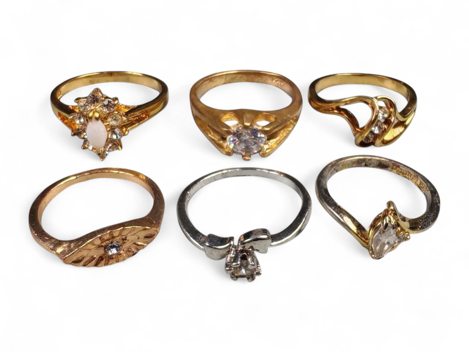 Lot of 6 Vintage and Contemporary Fashion Ring Lot, c. 20th-21st Century: This assorted lot of vintage and contemporary fashion rings offers a vibrant collection of statement pieces showcasing diverse styles, materials, and craftsmanship. Designed for decorative wear rather