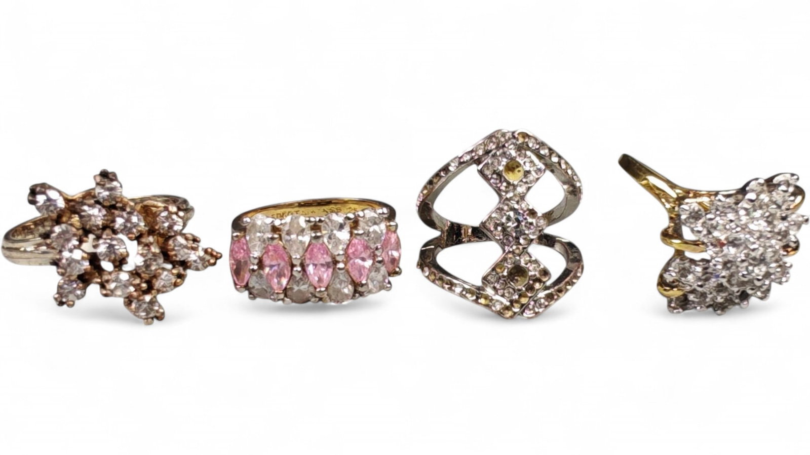 Lot of 4 Vintage and Contemporary Fashion Ring Lot, c. 20th-21st Century: This assorted lot of vintage and contemporary fashion rings offers a vibrant collection of statement pieces showcasing diverse styles, materials, and craftsmanship. Designed for decorative wear rather