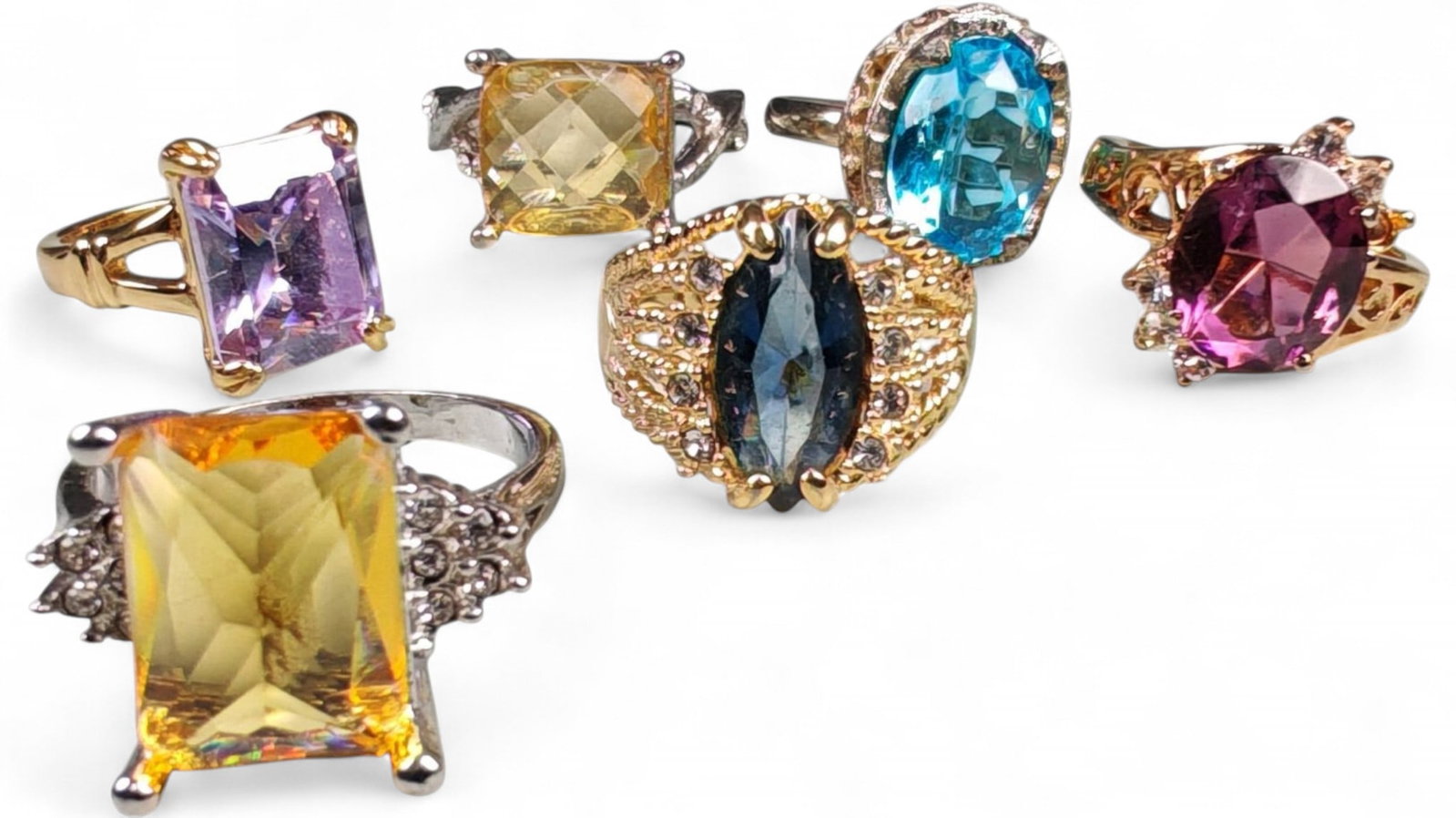 Lot of 6 Vintage and Contemporary Fashion Ring Lot, c. 20th-21st Century: This assorted lot of vintage and contemporary fashion rings offers a vibrant collection of statement pieces showcasing diverse styles, materials, and craftsmanship. Designed for decorative wear rather
