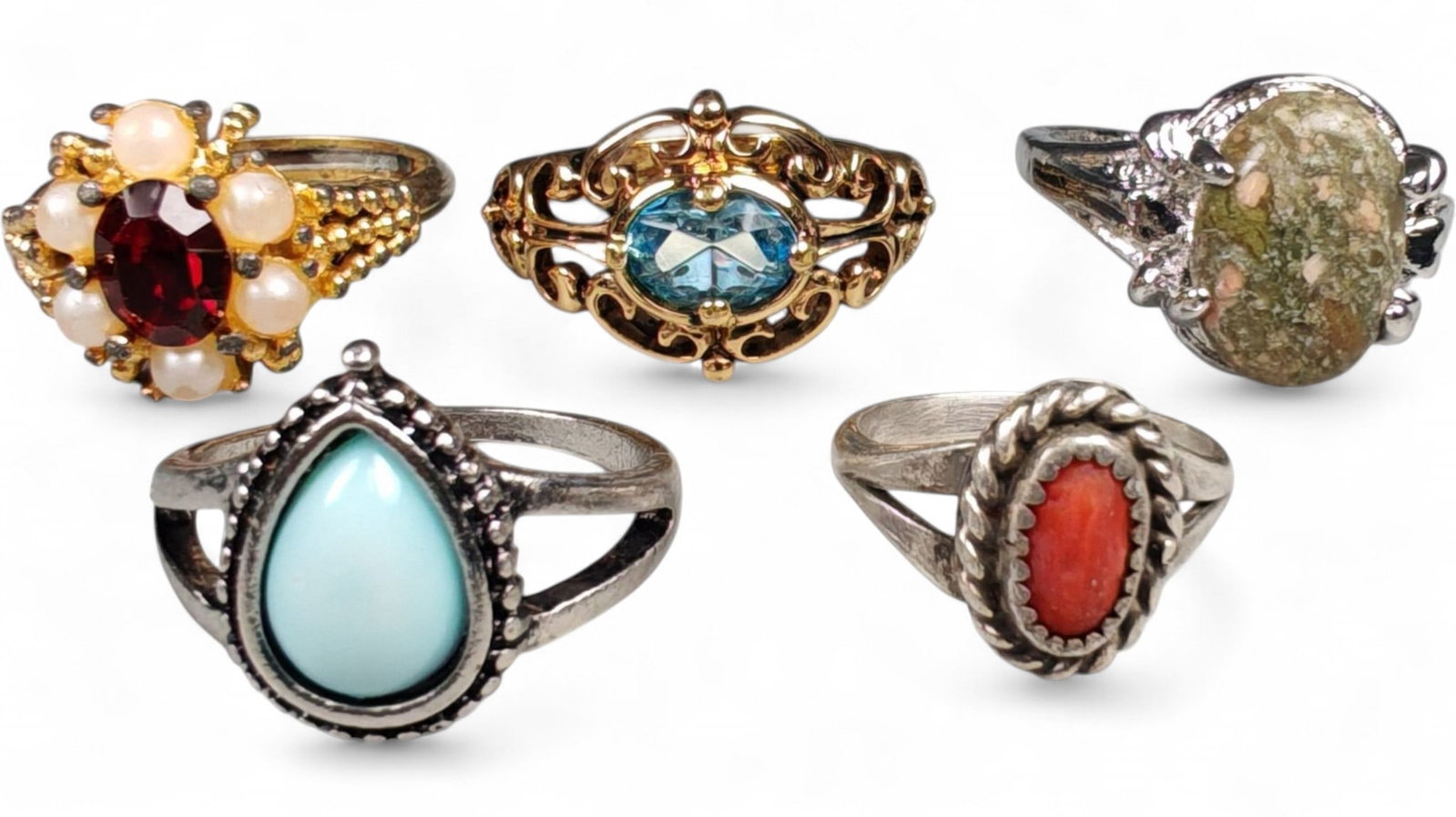 Lot of 5 Vintage and Contemporary Fashion Ring Lot, c. 20th-21st Century: This assorted lot of vintage and contemporary fashion rings offers a vibrant collection of statement pieces showcasing diverse styles, materials, and craftsmanship. Designed for decorative wear rather