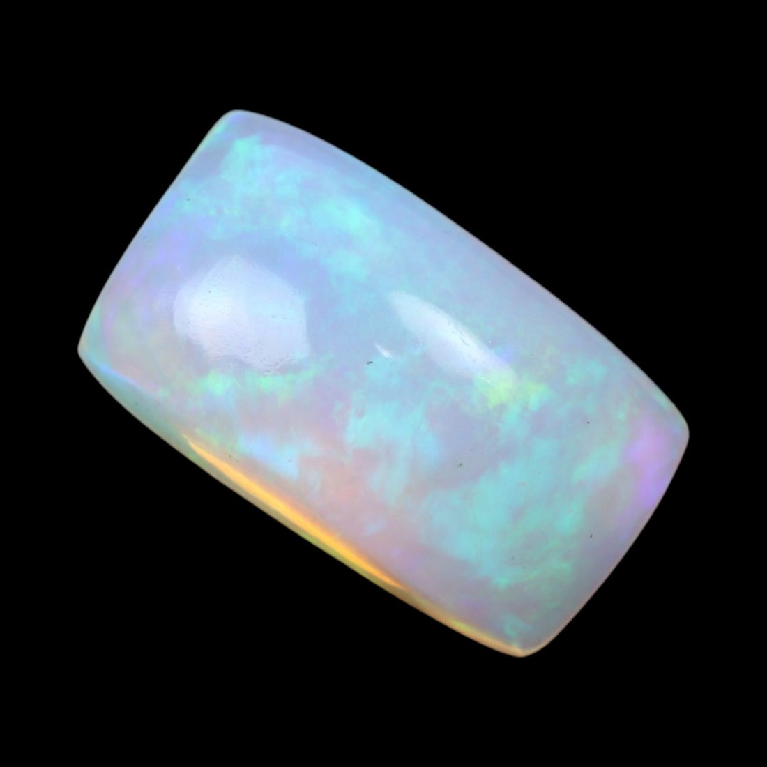 3.49 Carats Multi-Color Welo Opal Lot - Natural Ethiopian Stones: This radiant group of Welo opals displays a mesmerizing interplay of color that dances across the surface with every shift of light. Electric flashes of green, orange, and red ripple through a translu