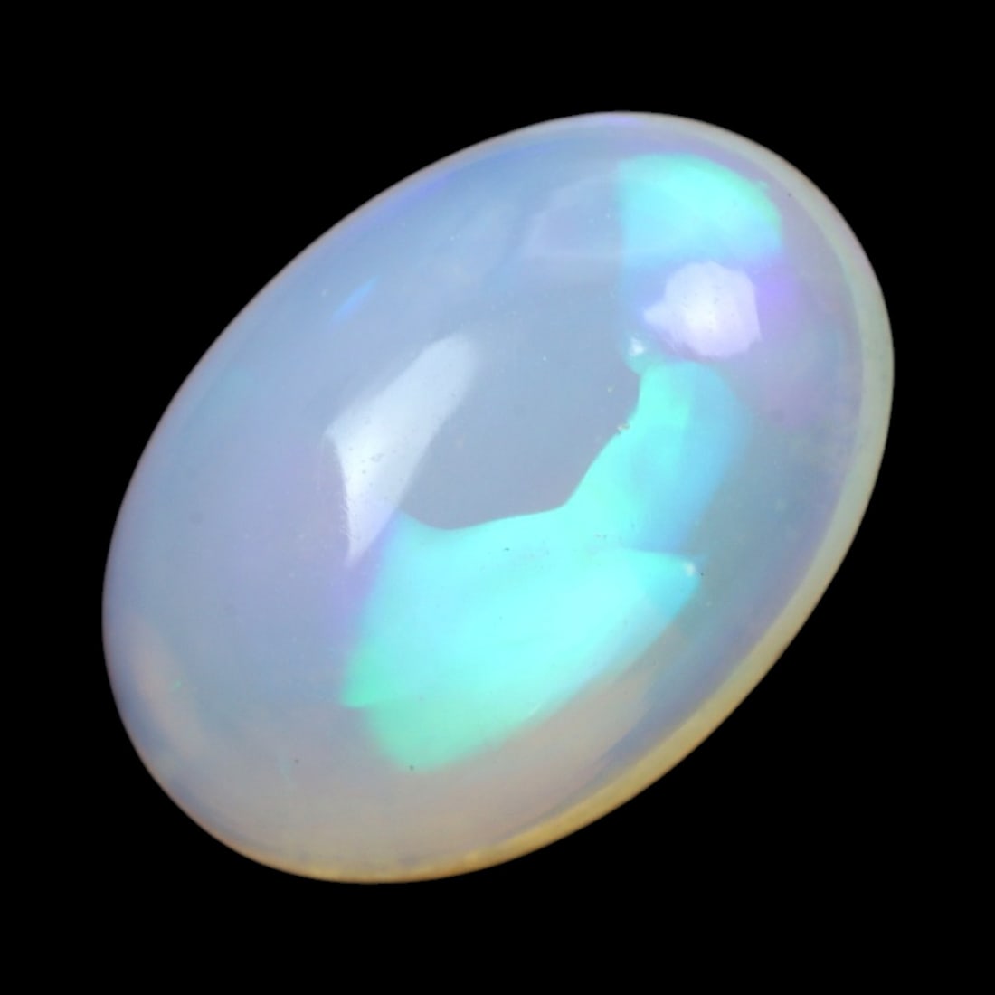 3.05 Carats Multi-Color Welo Opal Lot - Natural Ethiopian Stones: This radiant group of Welo opals displays a mesmerizing interplay of color that dances across the surface with every shift of light. Electric flashes of green, orange, and red ripple through a translu