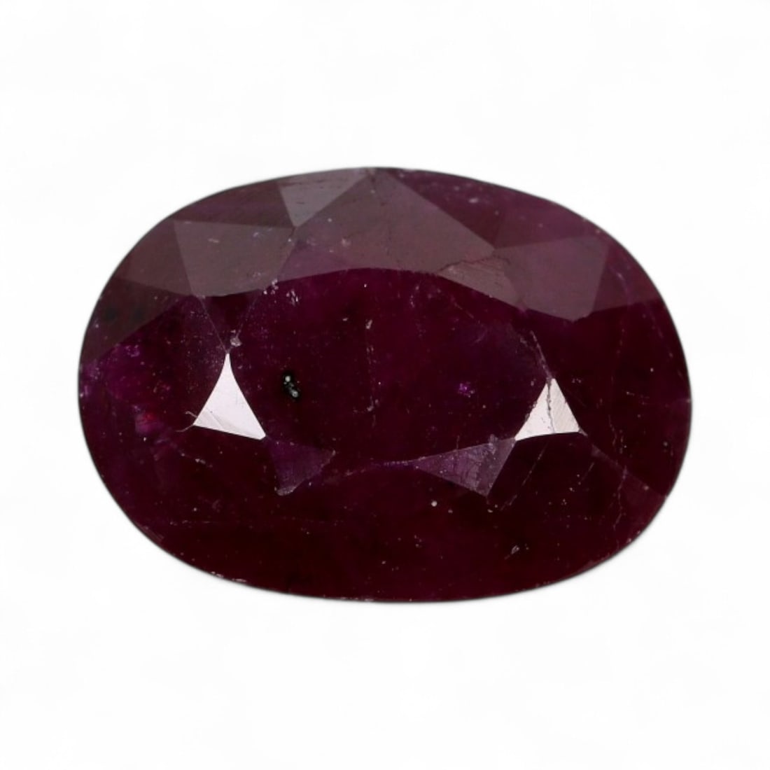 1.44 Carats Vivid Red Ruby Oval Lot - Natural Mozambique Stones: This striking lot of ruby ovals gleams with an intense, saturated red hue infused with a touch of magenta, exuding the classic vibrancy that defines fine ruby. Each gem, measuring approximately 9x6.7x