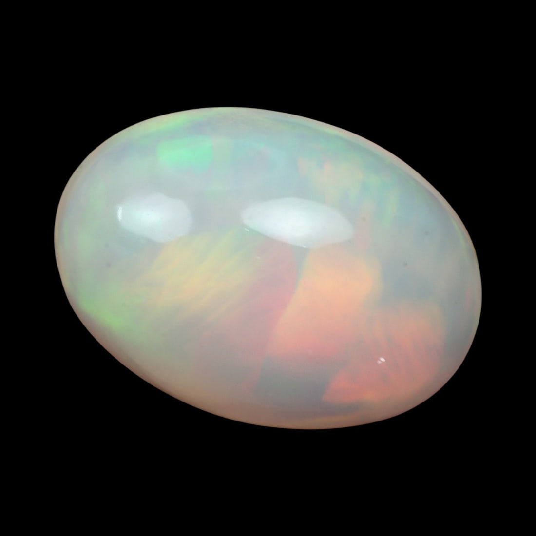 4.42 Carats Multi-Color Welo Opal Lot - Natural Ethiopian Stones: This radiant group of Welo opals displays a mesmerizing interplay of color that dances across the surface with every shift of light. Electric flashes of green, orange, and red ripple through a translu
