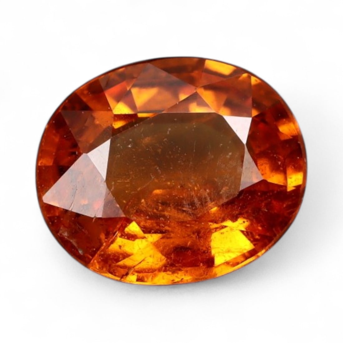 1.19 Carats Golden-Orange Faceted Songea Sapphire - Natural Tanzanian Stones: This vibrant of Songea sapphires glows with a fiery palette ranging from deep amber and burnt orange to bright golden honey tones. Each gem, averaging 6.9x5.8x3.0 mm, is expertly faceted to maximize b