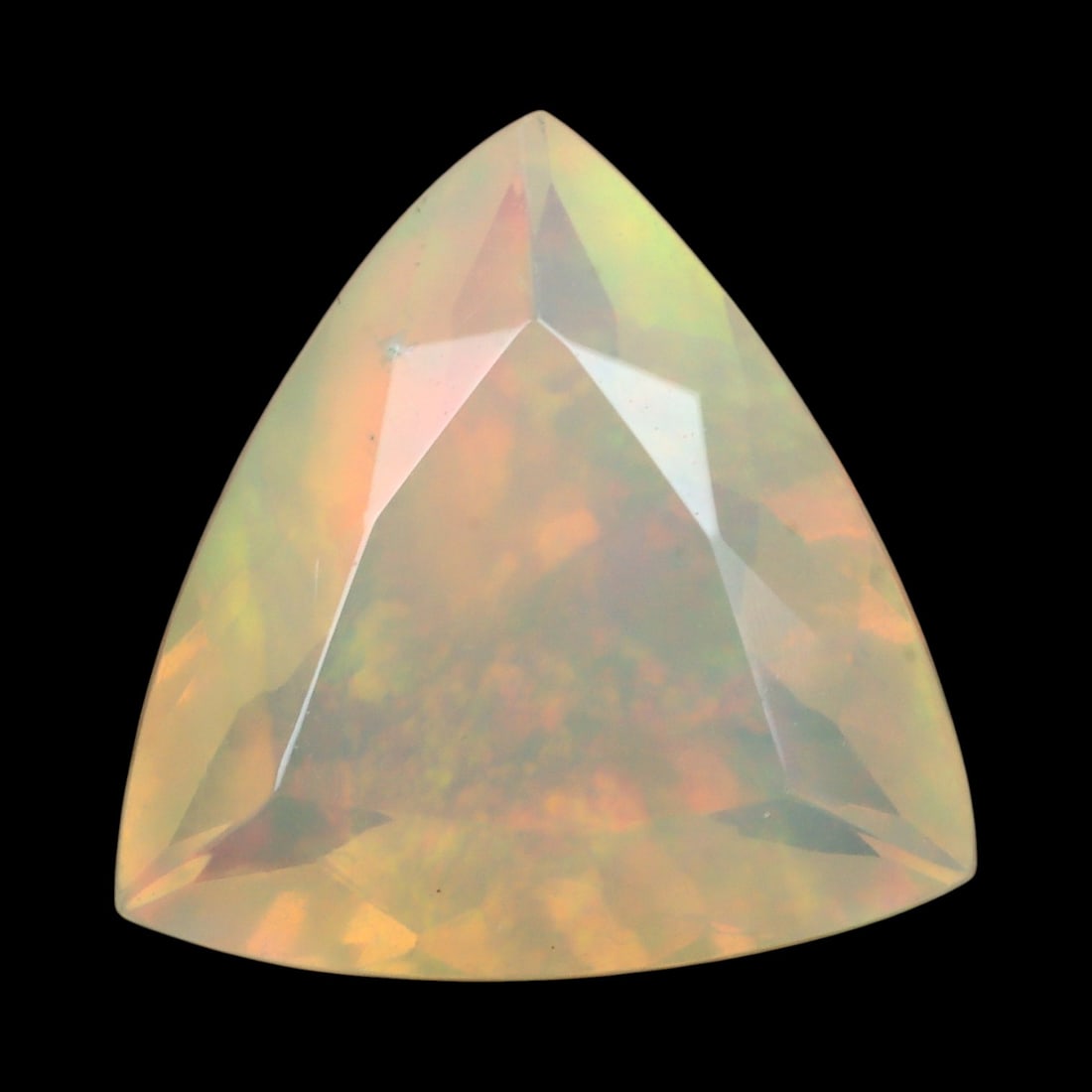 2.76 Carats Faceted Welo Opal - Natural Ethiopian Stone: This graceful 11.3x10.9x6.2 mm Ethiopian opal radiates a soft yet vibrant play-of-color, with hues of green, orange, and rose blending harmoniously beneath its faceted surface. The gem displays a flui