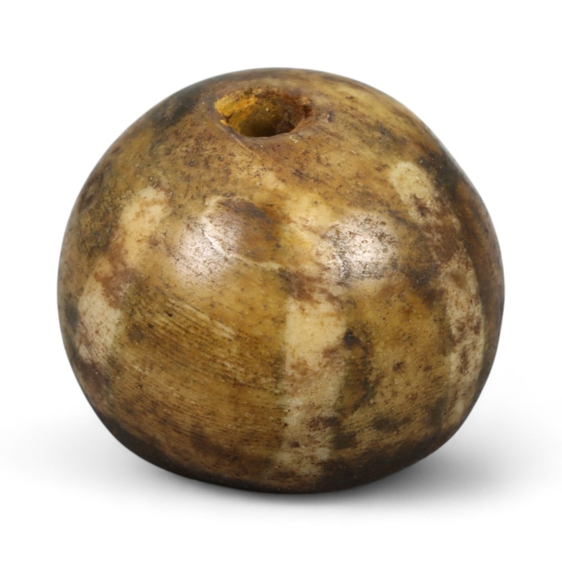 Ancient Pyu Pumtek Petrified Palm Bead, c. 1st Millennium CE, 1.5cm: This ancient Pumtek bead, measuring 1.5 cm, originates from the Pyu culture of Burma (modern Myanmar) and dates to the 1st millennium CE. Fashioned from petrified palm wood, Pumtek beads are among the
