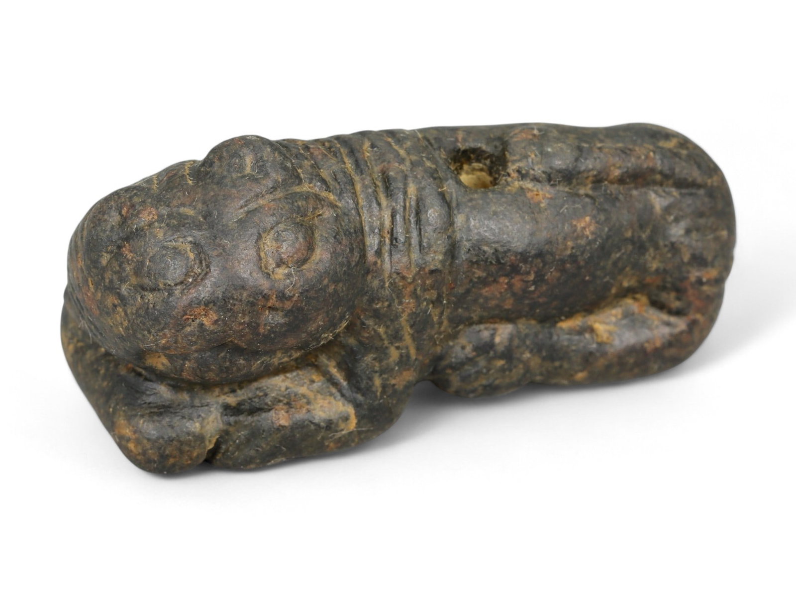 Ancient Mesopotamian Neo-Sumerian Carved Black Stone Feline Amulet, c. 2100-2000 BCE 25g: This compact and finely carved black stone amulet originates from the Neo-Sumerian Period (Ur III Dynasty), c. 2112-2004 BCE. The piece depicts a crouching feline with oversized eyes and a rounded hea