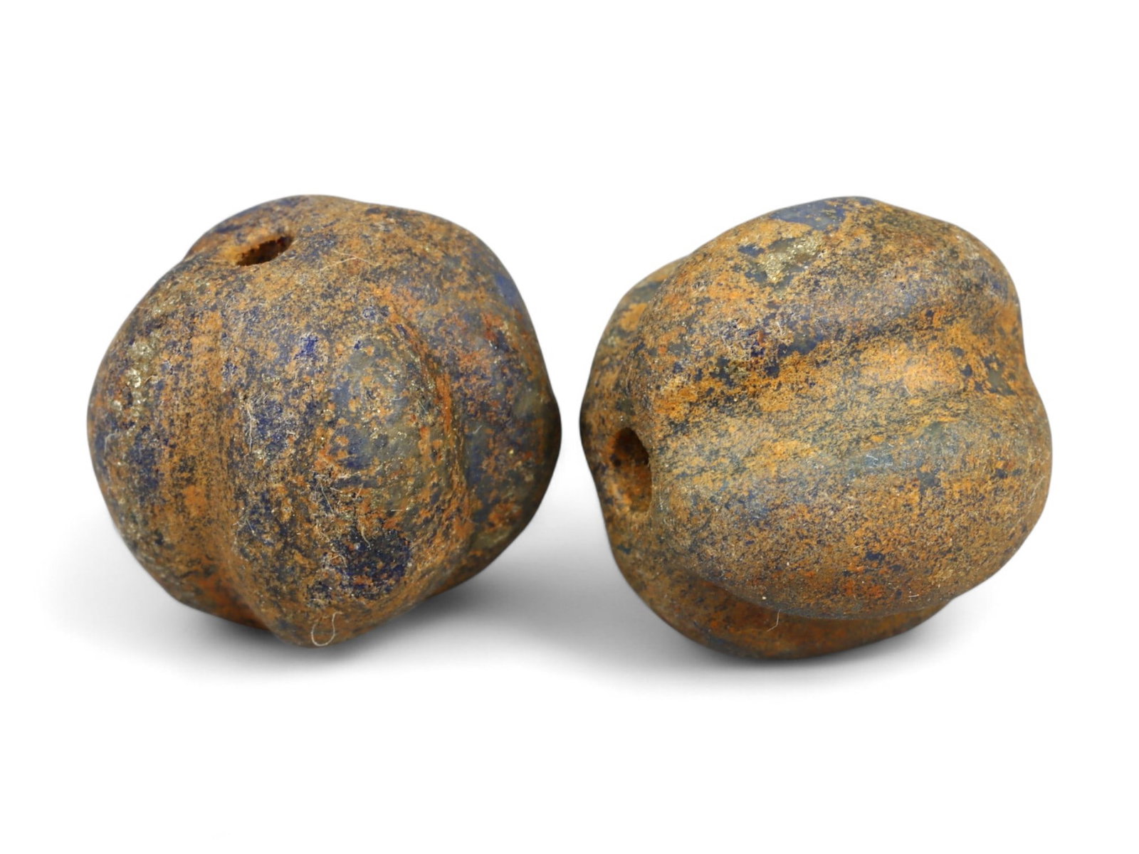Ancient Neo-Assyrian Pair of Lapis Lazuli Melon-Shaped Beads, c. 9th-7th Century BCE, 1.5cm, 7g: This pair of carved lapis lazuli beads, formed in the classic melon shape, dates to the Neo-Assyrian period, c. 9th-7th century BCE. Beads of this type were both decorative and symbolic, strung into n