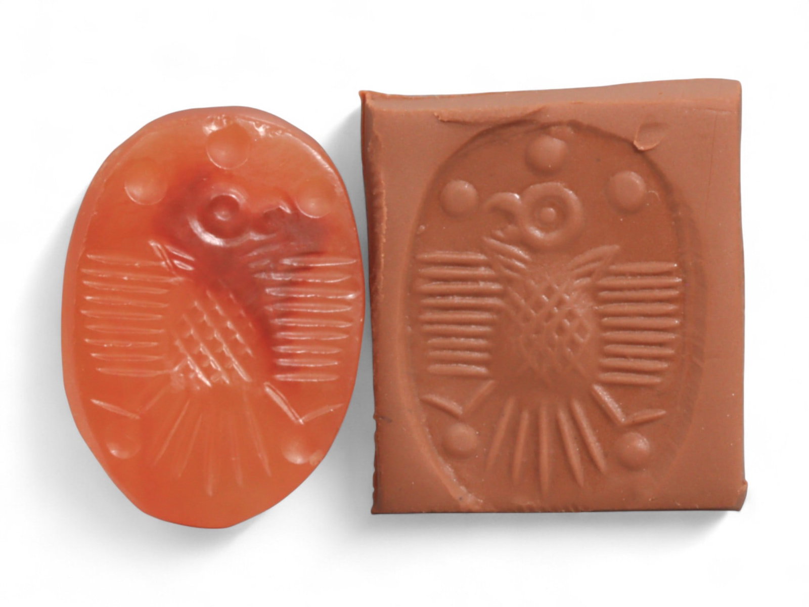 Ancient Sasanian Carnelian Intaglio with Engraving Motif, 2cm, 2g: This carnelian intaglio, finely engraved into the warm red tones of semi-precious stone, reflects a tradition of craftsmanship spanning from the classical world to the early modern era. Intaglios serv