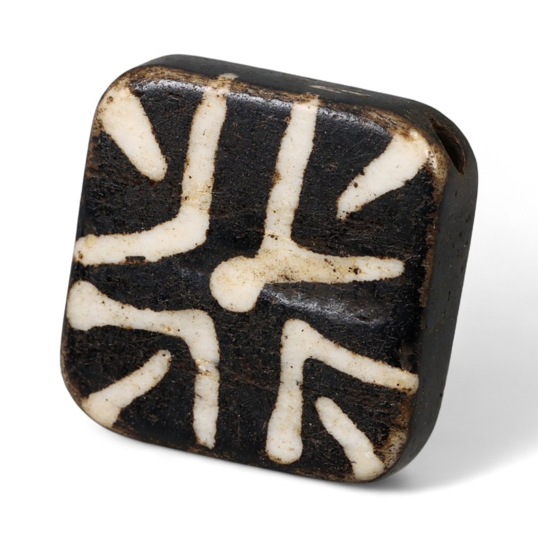 Antique Pyu Pumtek Etched Fossilized Bead, c. 18th-19th Century CE, 1.9cm: This antique Pumtek bead, originating from the Pyu cultural traditions of Burma (modern Myanmar), dates to the 18th-19th century CE. Carved from fossilized palm wood, its surface has been etched with 