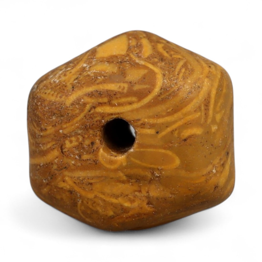 Ancient Indus Valley Fossilized Stromatolite Bead, c. 3rd-2nd Millennium BCE, 1cm: This remarkable bead is carved from fossilized stromatolite, a stone composed of layered mineral deposits created by some of Earth's earliest microbial life. Stromatolite beads were especially prized 