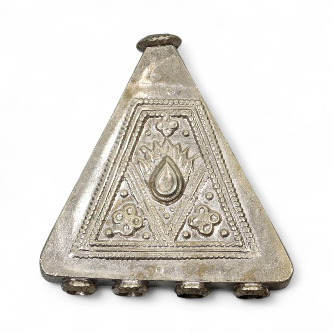 Antique Himalayan Triangular Silver Amulet Pendant, c. 19th Century, 5cm: This striking triangular silver amulet pendant originates from the Himalayan cultural region, most likely Nepal or Tibet, and dates to the 19th century. Such pendants, often worn suspended from a neck