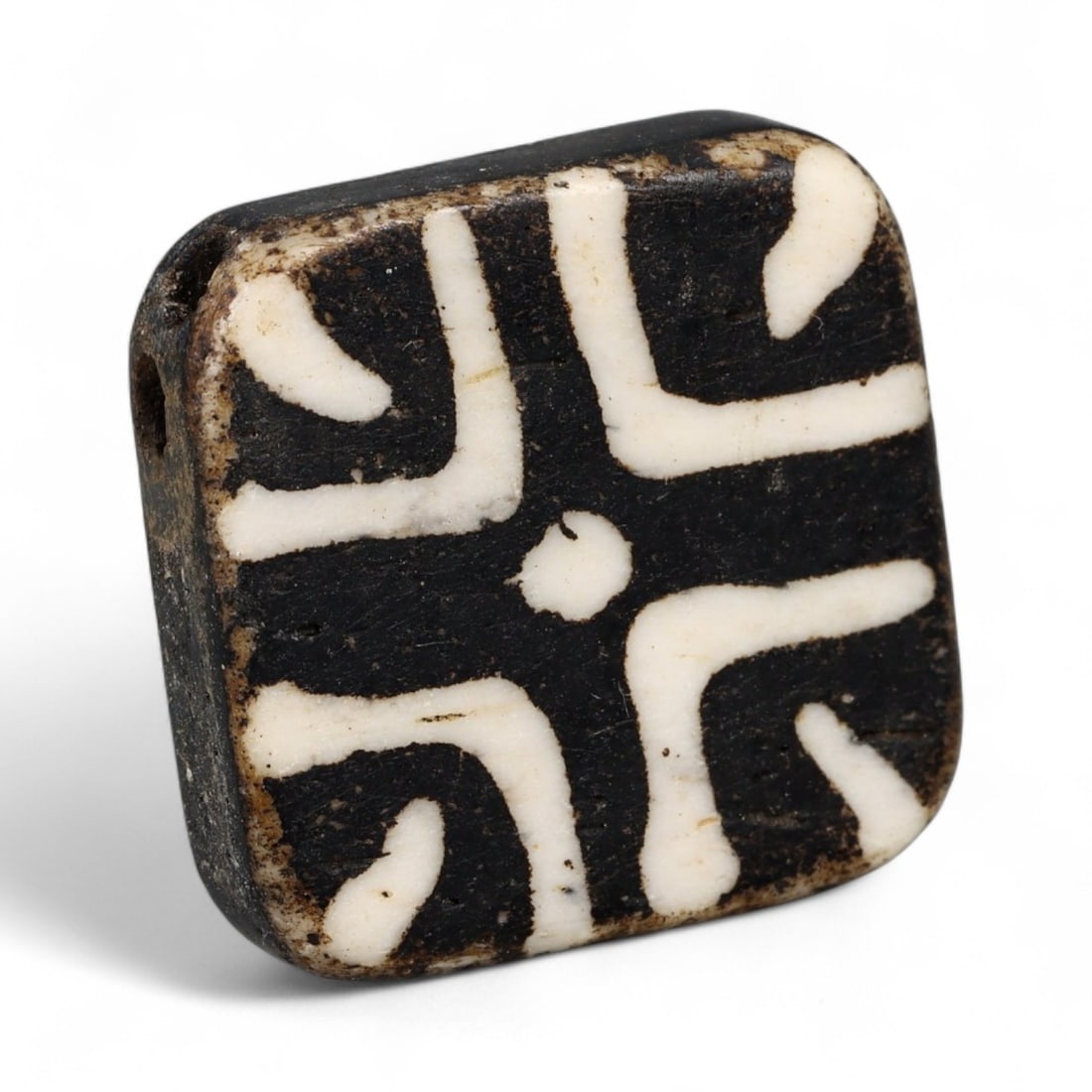 Antique Pyu Pumtek Etched Fossilized Bead, c. 18th-19th Century CE, 1.9cm: This antique Pumtek bead, originating from the Pyu cultural traditions of Burma (modern Myanmar), dates to the 18th-19th century CE. Carved from fossilized palm wood, its surface has been etched with 