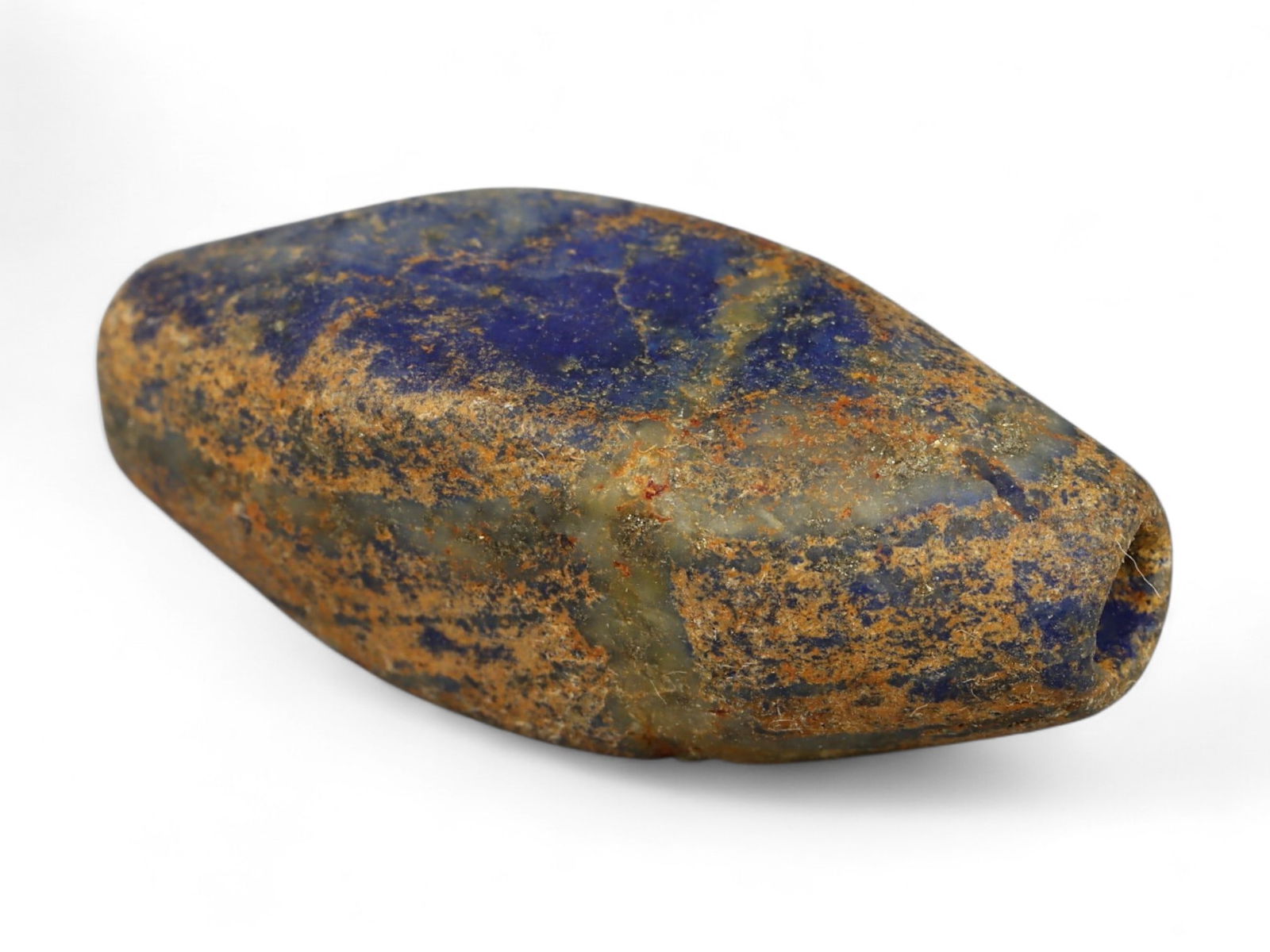 Ancient Mesopotamian Lapis Lazuli Bead, c. 2nd-1st Millennium BCE, 2.5cm: This ancient lapis lazuli bead, dating to the 2nd-1st millennium BCE, originates from the cradle of civilization in Mesopotamia, a region celebrated for its pioneering artistry and long-standing trade