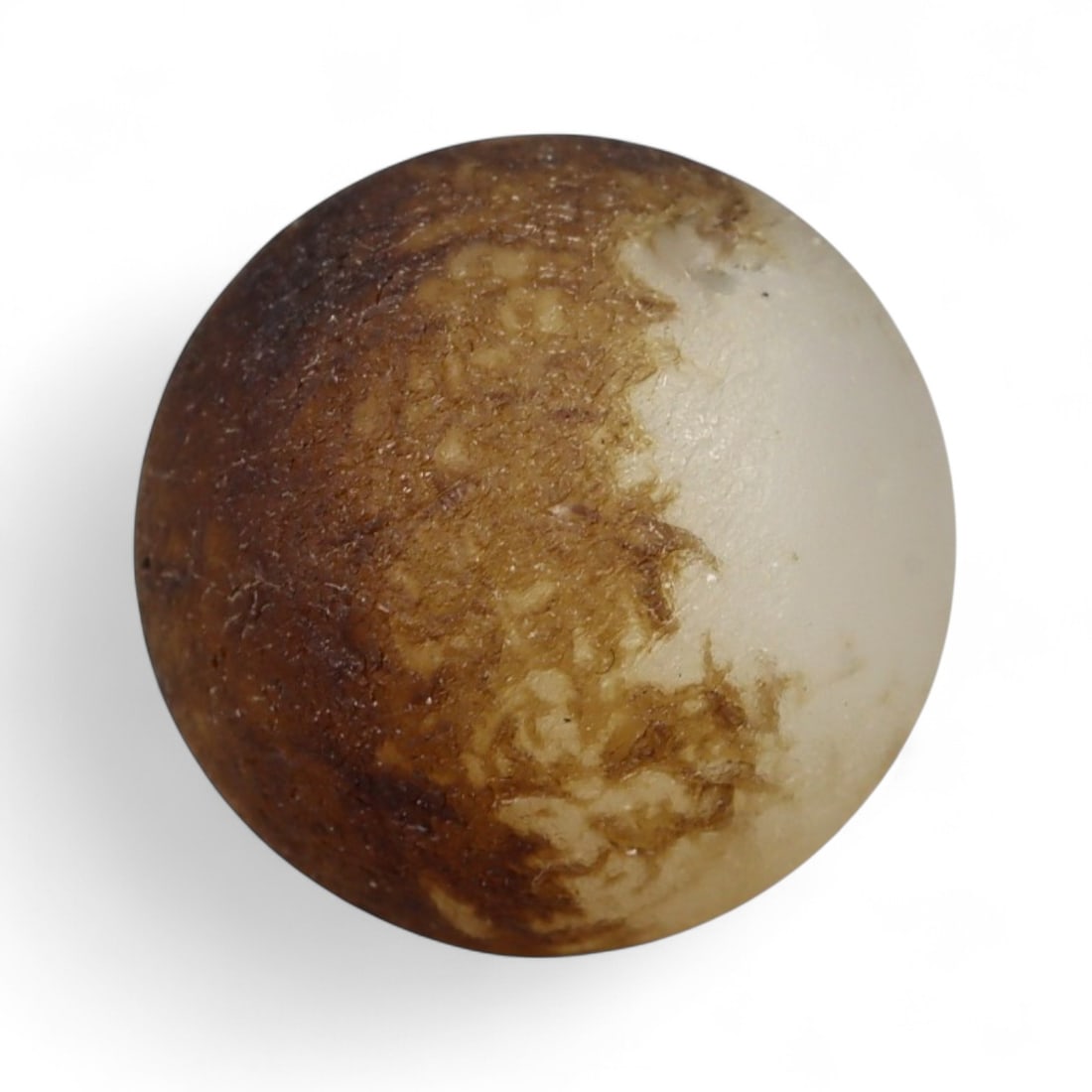 Ancient Himalayan Banded Agate Spherical Dzi Bead, c. 3rd-7th Century CE, 1.5cm: This elegant spherical bead, carved from natural agate and measuring 2 cm, exemplifies the refined simplicity of Himalayan Dzi tradition. Its smooth, rounded form reveals delicate layers of cream, smo