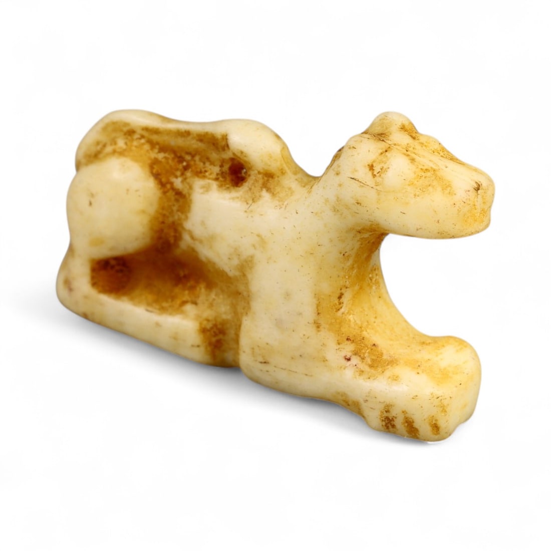 Ancient Egyptian Bone Amulet of Anubis, c. 1550-1069 BCE, 2.5cm: This small yet profoundly symbolic amulet, carved from smooth bone, represents the jackal-headed god Anubis-guardian of the necropolis and protector of the dead. Dating to Egypt's New Kingdom period, 