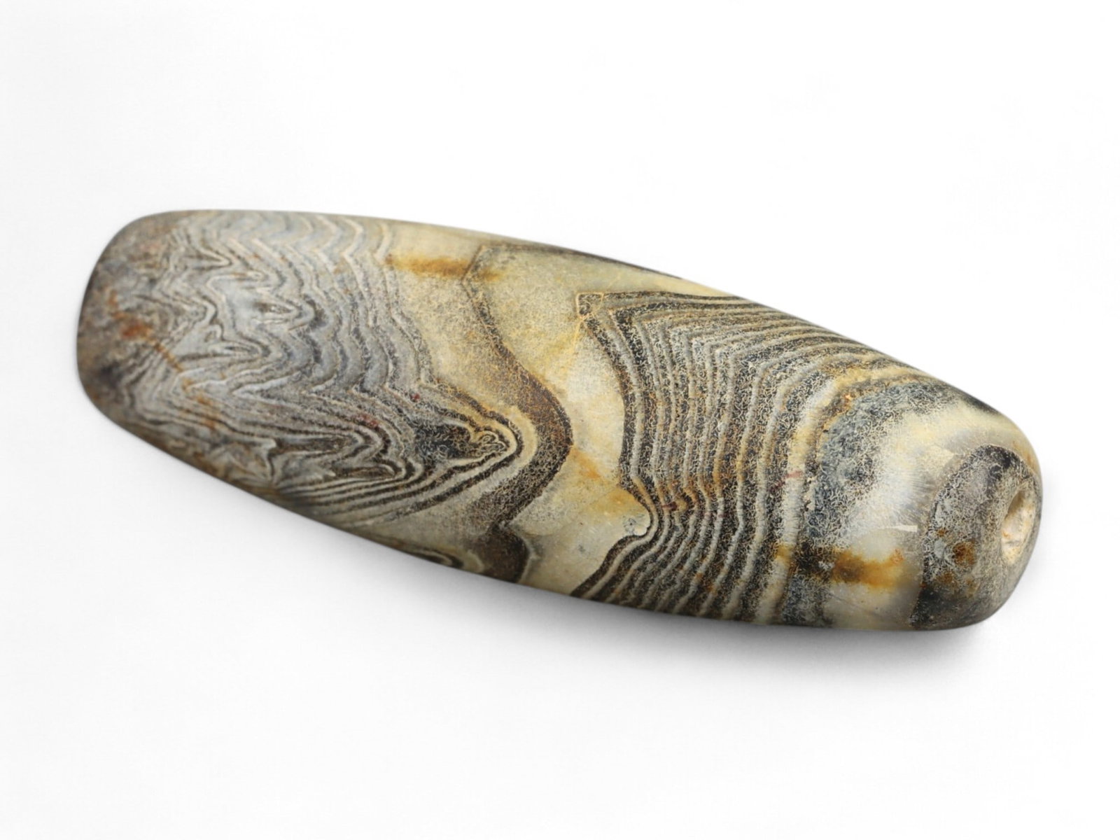 Ancient Gandhara Banded Sulaimani Agate Bead, c. 1st-3rd Century CE, 3cm: This striking banded agate bead, often referred to as a Sulaimani bead, originates from the Gandhara region, c. 1st-3rd century CE, during the height of the Kushan Empire. Gandhara, straddling present