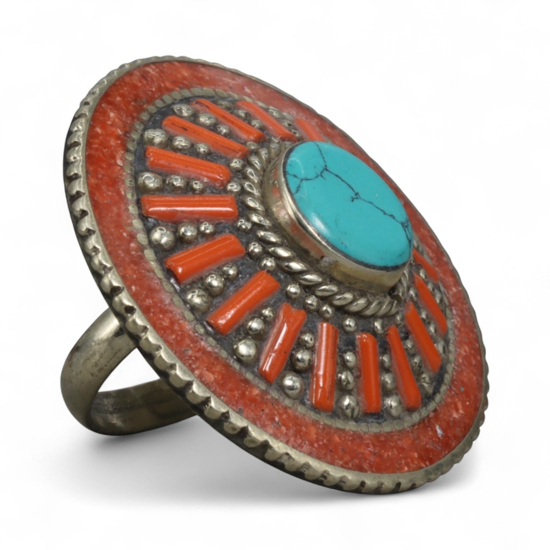 Vintage Himalayan Turquoise Coral Silver Sunburst Ring, Mid-20th Century, US 8, 4cm: This bold vintage ring, crafted in the mid-20th century, embodies the radiant artistry of Himalayan jewelry traditions. Measuring 4 cm across the bezel and sized at US 8, it is a striking statement pi