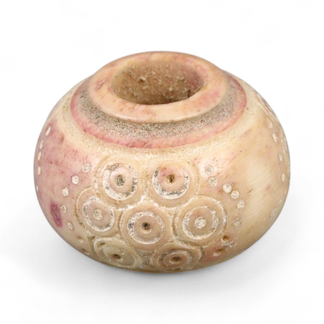 Ancient Medieval Nishapur Silk Road Bone Spindle Whorl, c. 9th-11th Century CE, 1.9cm: This finely carved spindle whorl originates from Nishapur, an important Silk Road city in medieval northeastern Iran, dating to approximately the 9th-11th century CE. Such spindle whorls were essentia