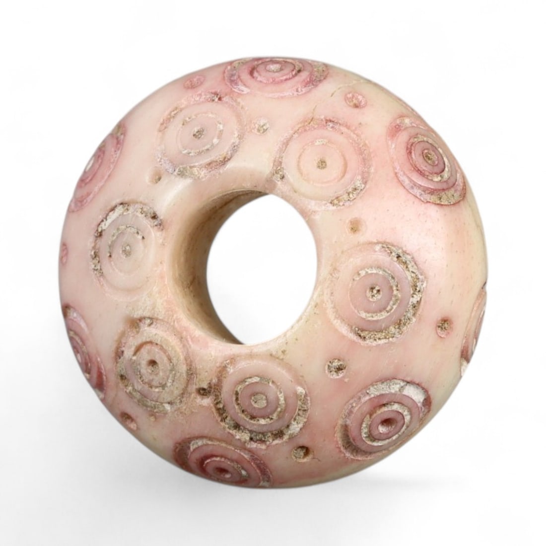 Ancient Medieval Nishapur Silk Road Bone Spindle Whorl, c. 9th-11th Century CE, 1.8cm: This finely carved spindle whorl originates from Nishapur, an important Silk Road city in medieval northeastern Iran, dating to approximately the 9th-11th century CE. Such spindle whorls were essentia