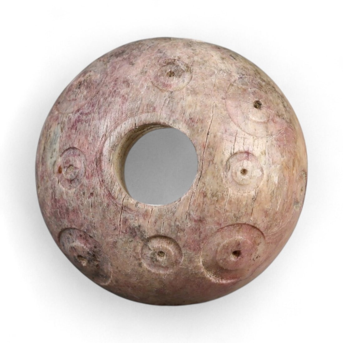 Ancient Medieval Nishapur Silk Road Bone Spindle Whorl, c. 9th-11th Century CE, 2cm: This finely carved spindle whorl originates from Nishapur, an important Silk Road city in medieval northeastern Iran, dating to approximately the 9th-11th century CE. Such spindle whorls were essentia