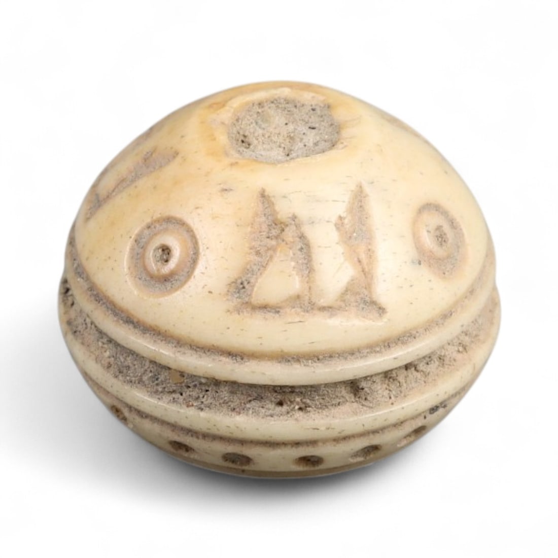 Ancient Medieval Nishapur Silk Road Bone Spindle Whorl, c. 9th-11th Century CE, 1.4cm: This finely carved spindle whorl originates from Nishapur, an important Silk Road city in medieval northeastern Iran, dating to approximately the 9th-11th century CE. Such spindle whorls were essentia