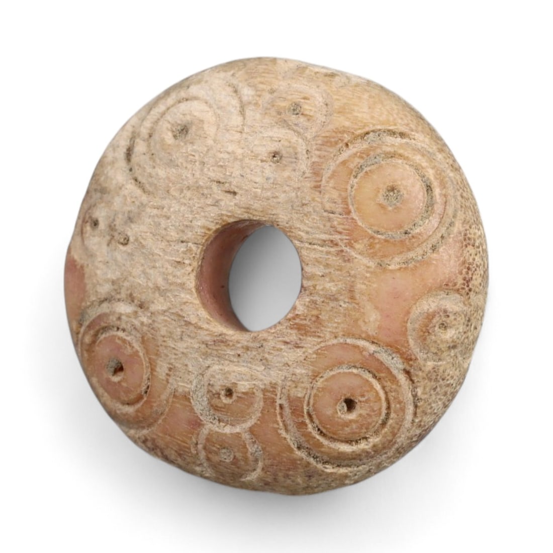 Ancient Medieval Nishapur Silk Road Bone Spindle Whorl, c. 9th-11th Century CE, 1.8cm: This finely carved spindle whorl originates from Nishapur, an important Silk Road city in medieval northeastern Iran, dating to approximately the 9th-11th century CE. Such spindle whorls were essentia