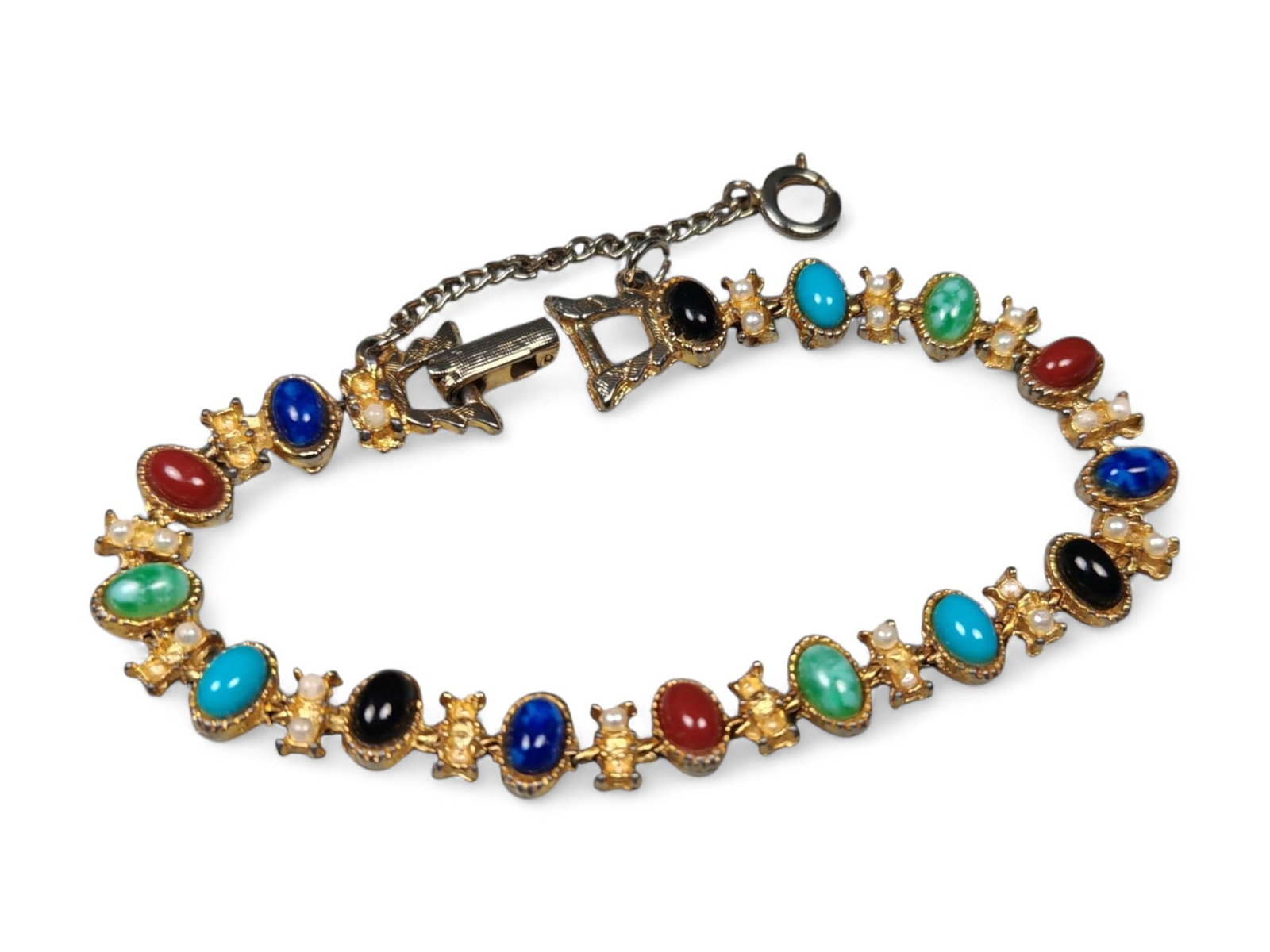 Multicolor Cabochon and Pearl Accent Bracelet - Vintage Gold-Tone Design: This exquisite vintage bracelet dazzles with a symphony of color and refined craftsmanship. Measuring approximately 7 cm in diameter, it features alternating oval cabochons in vibrant hues of turquois
