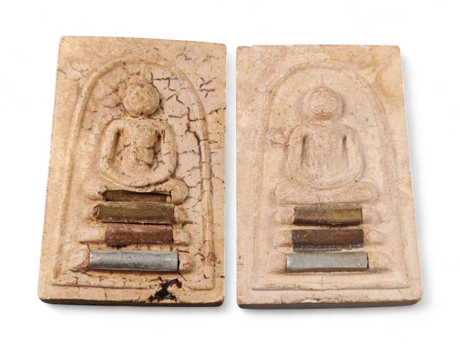 Vintage Thai Pair of Somdej Buddha Image Clay Amulets with Metal Inserts, c. 20th Century, 3.5cm: This pair of vintage Thai amulets presents the classic Somdej style, each depicting the Buddha seated in meditation upon a stepped base within an arched frame. Crafted in clay during the 20th century,