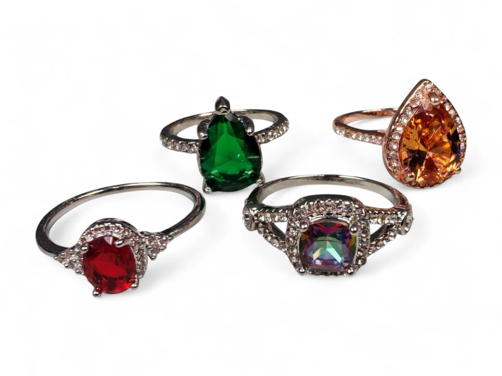 Lot of 4 Vintage and Contemporary Fashion Ring Lot, c. 20th-21st Century: This assorted lot of vintage and contemporary fashion rings offers a vibrant collection of statement pieces showcasing diverse styles, materials, and craftsmanship. Designed for decorative wear rather