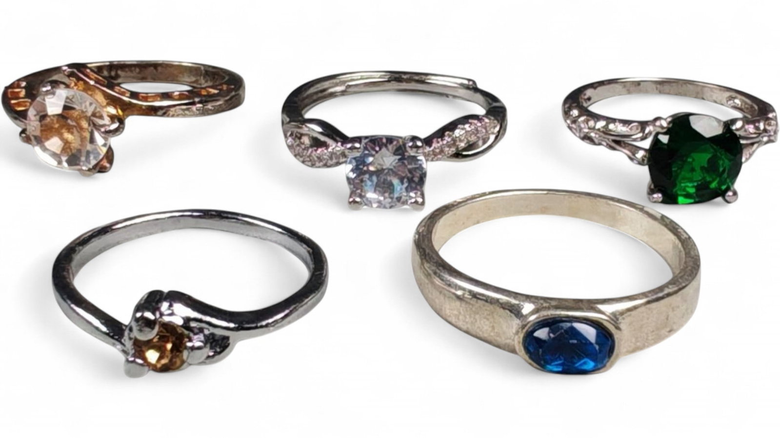 Lot of 5 Vintage and Contemporary Fashion Ring Lot, c. 20th-21st Century: This assorted lot of vintage and contemporary fashion rings offers a vibrant collection of statement pieces showcasing diverse styles, materials, and craftsmanship. Designed for decorative wear rather