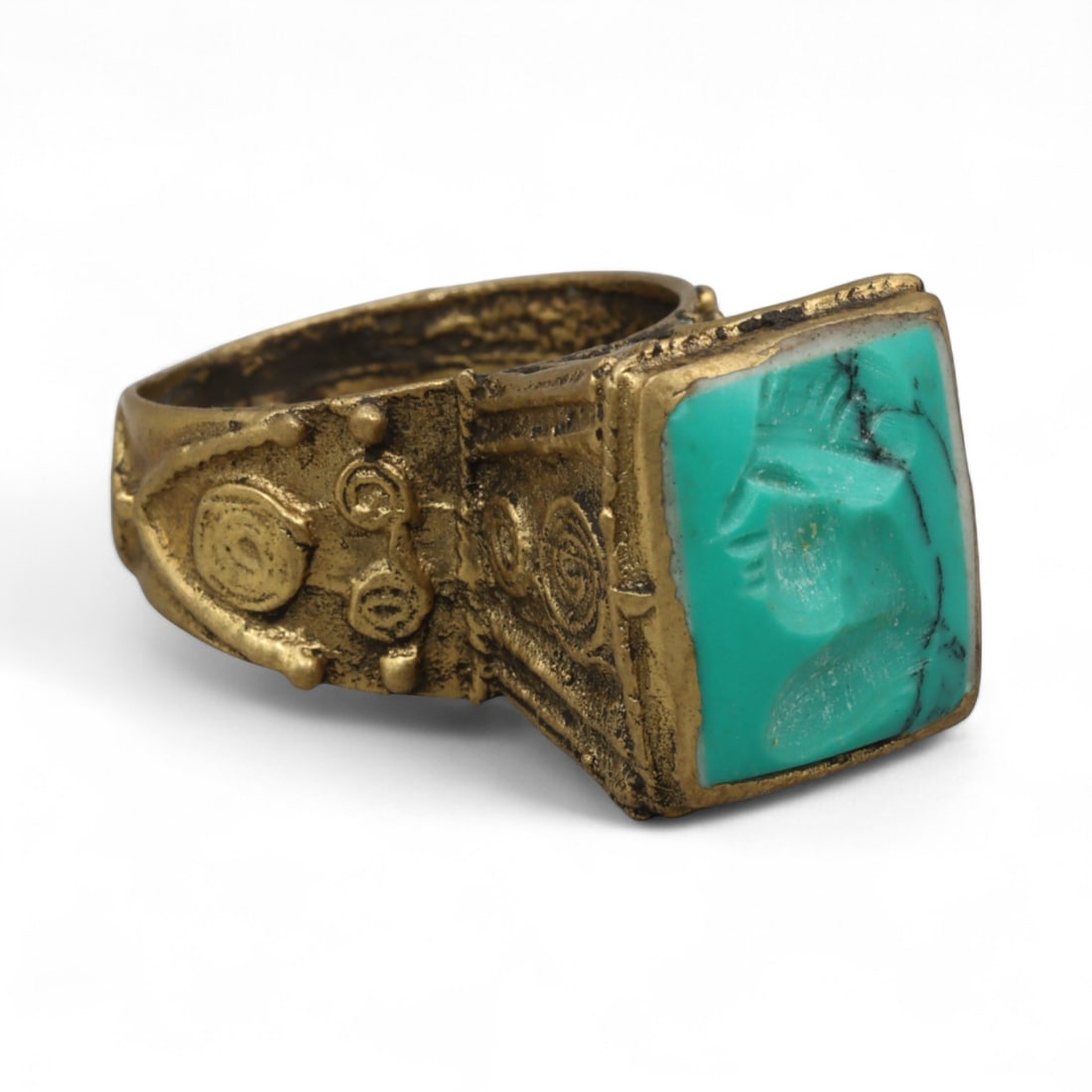 Antique Qajar Gold Gilt Intaglio Signet Ring, c. 19th-20th Century, 9 US: This substantial gilt ring, dating to the Qajar era of the 19th-20th century, embodies the regal aesthetic and cultural refinement of Persian jewelry traditions. The bezel is set with an engraved inta