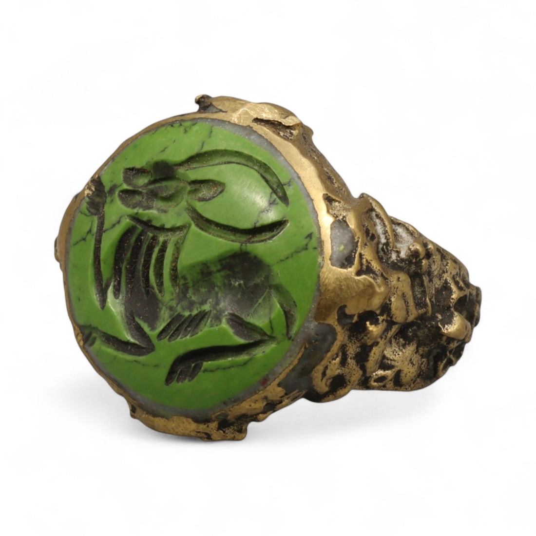 Antique Qajar Gold Gilt Intaglio Signet Ring, c. 19th-20th Century, 6.5 US: This substantial gilt ring, dating to the Qajar era of the 19th-20th century, embodies the regal aesthetic and cultural refinement of Persian jewelry traditions. The bezel is set with an engraved inta