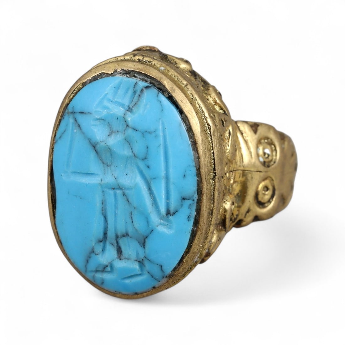 Antique Qajar Gold Gilt Intaglio Signet Ring, c. 19th-20th Century, 8 US: This substantial gilt ring, dating to the Qajar era of the 19th-20th century, embodies the regal aesthetic and cultural refinement of Persian jewelry traditions. The bezel is set with an engraved inta