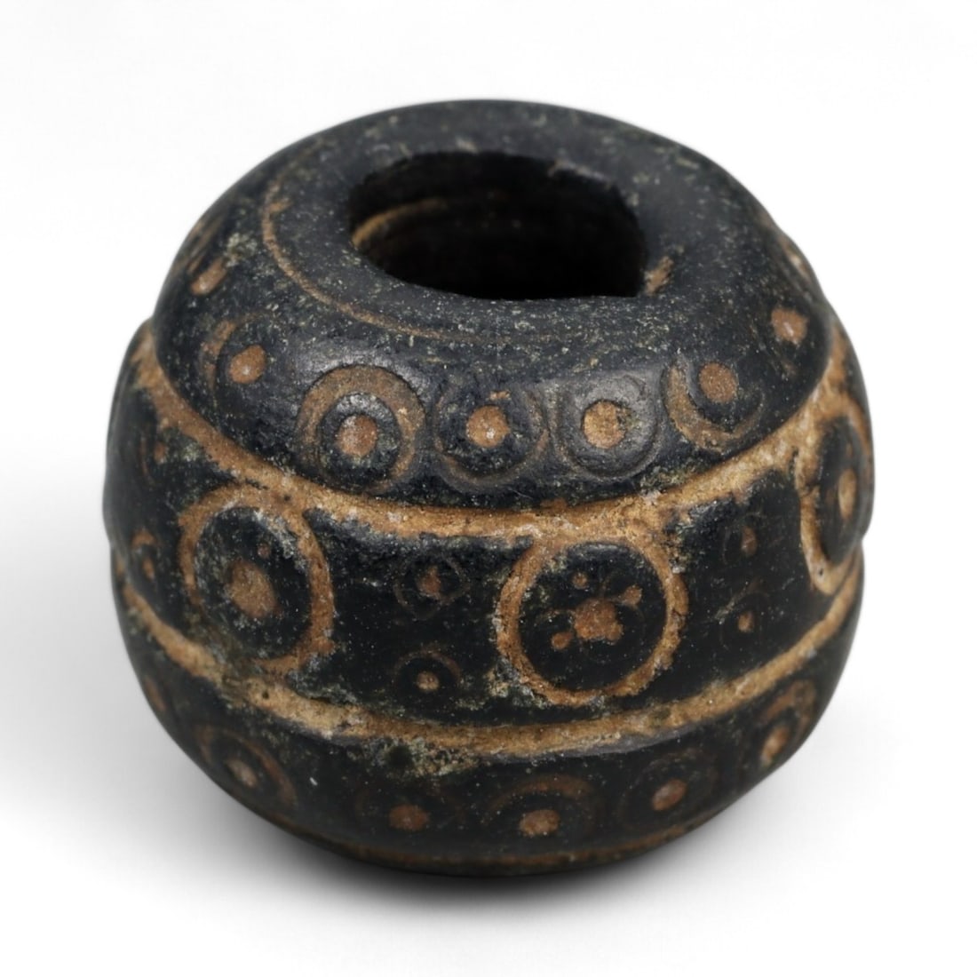 Ancient Medieval Nishapur Silk Road Bone Spindle Whorl, c. 9th-11th Century CE, 1.4cm: This finely carved spindle whorl originates from Nishapur, an important Silk Road city in medieval northeastern Iran, dating to approximately the 9th-11th century CE. Such spindle whorls were essentia